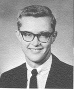 black and white picture of a man in glasses 