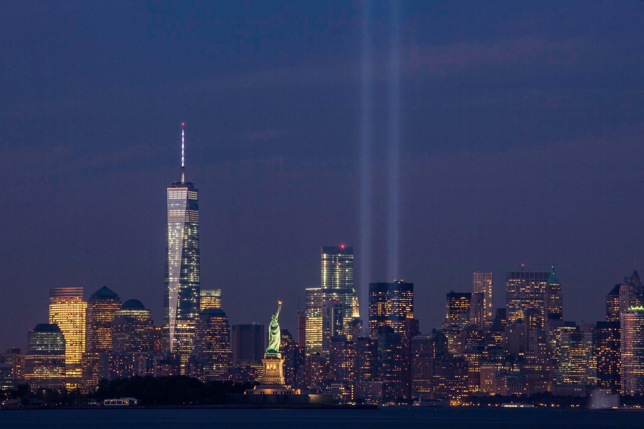 Image from the Tribute in Light on September 11, 2014. It shows the New York City skyline with two beams of light representing the fallen towers.
