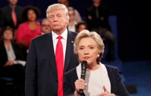 Donald Drumpf looming behind Hillary Clinton at the second presidential debate of 2016.