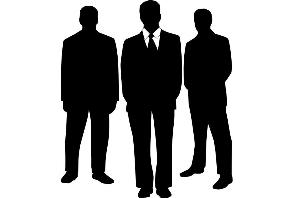 Three silhouette figures of men in suits.