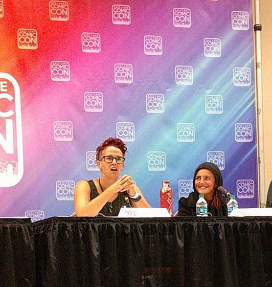 Debra Jenson and her daughter sitting on a panel at the Salt Lake Comic Con