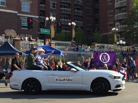 A picture of the Ordain Women banner, held up during the Pioneer Day parade in 2016.